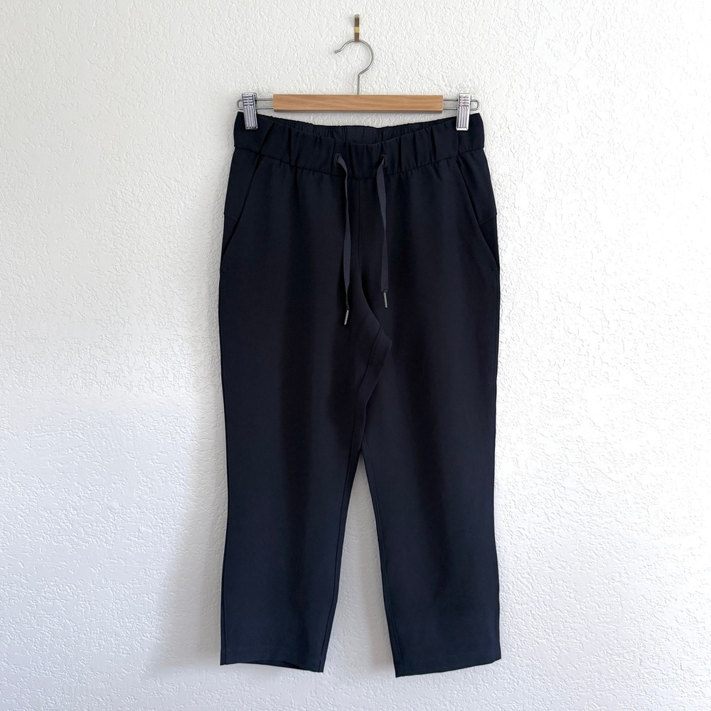 Lululemon On the Fly Crop True Navy Luxtreme Drawstring Pants Commuter Size 4 - Picture 5 of 14